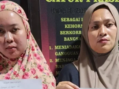 Dua perempuan di Bulukumba menyampaikan klarifikasi dan permintaan maaf didampingi aparat kepolisian.